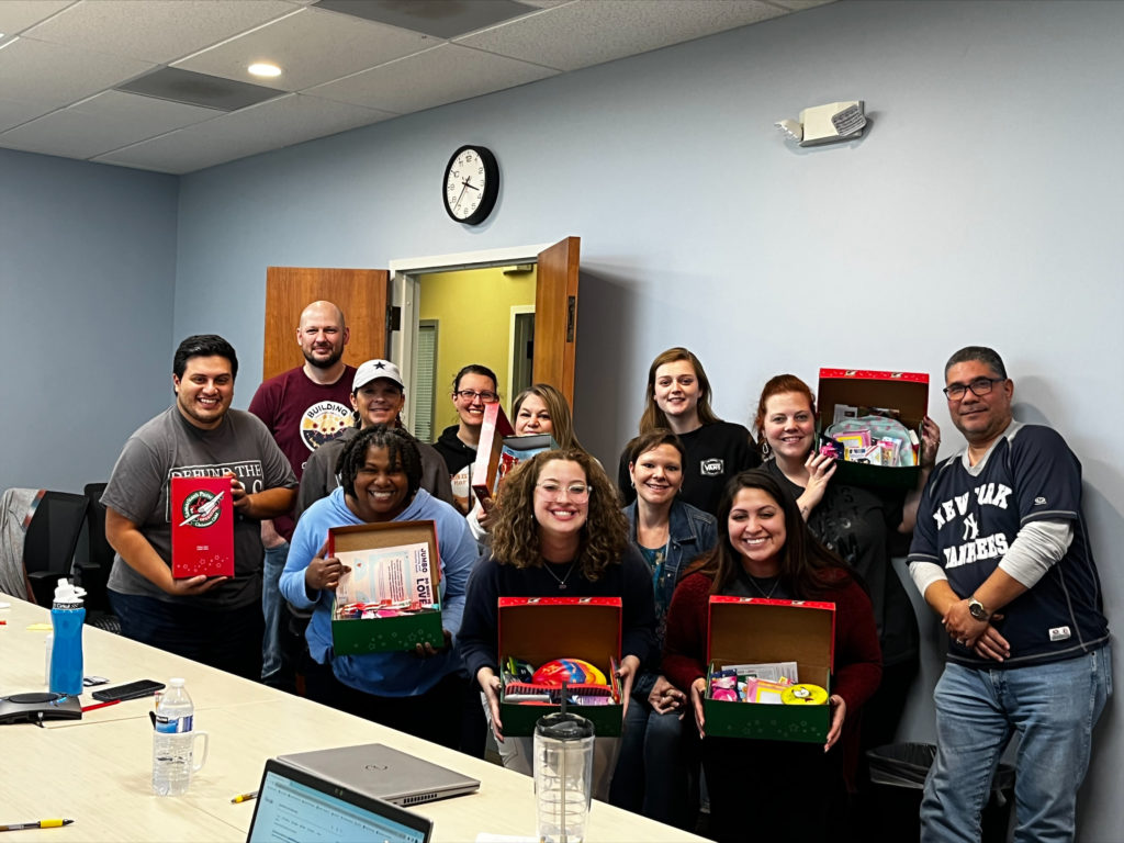 acclaim staff with samaritan's purse boxes